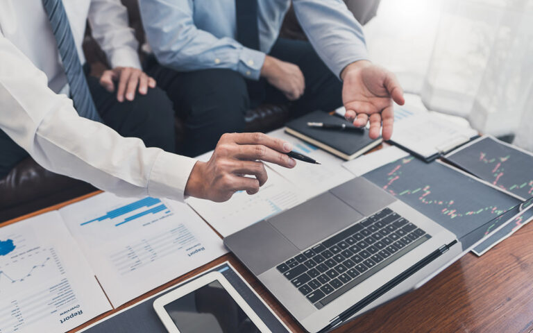 finance investing meeting with reports