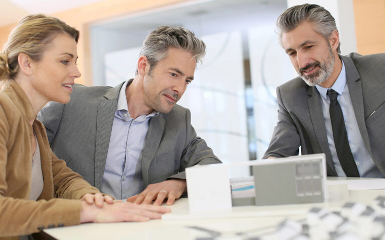 couple talking with financial planner